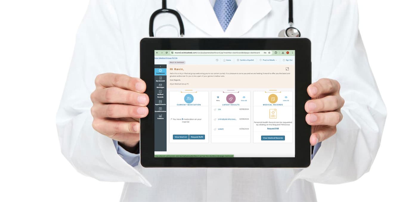 A doctor reviewing records on a tablet