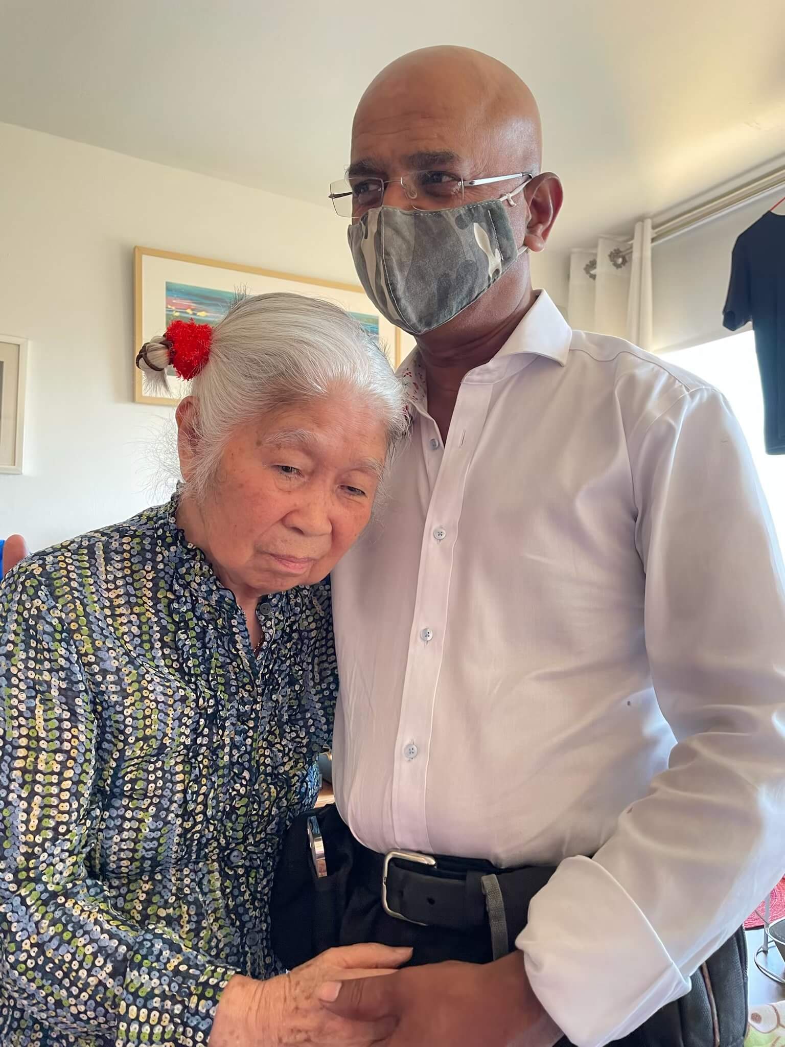 Dr. Ravichandra with a patient during a home visit