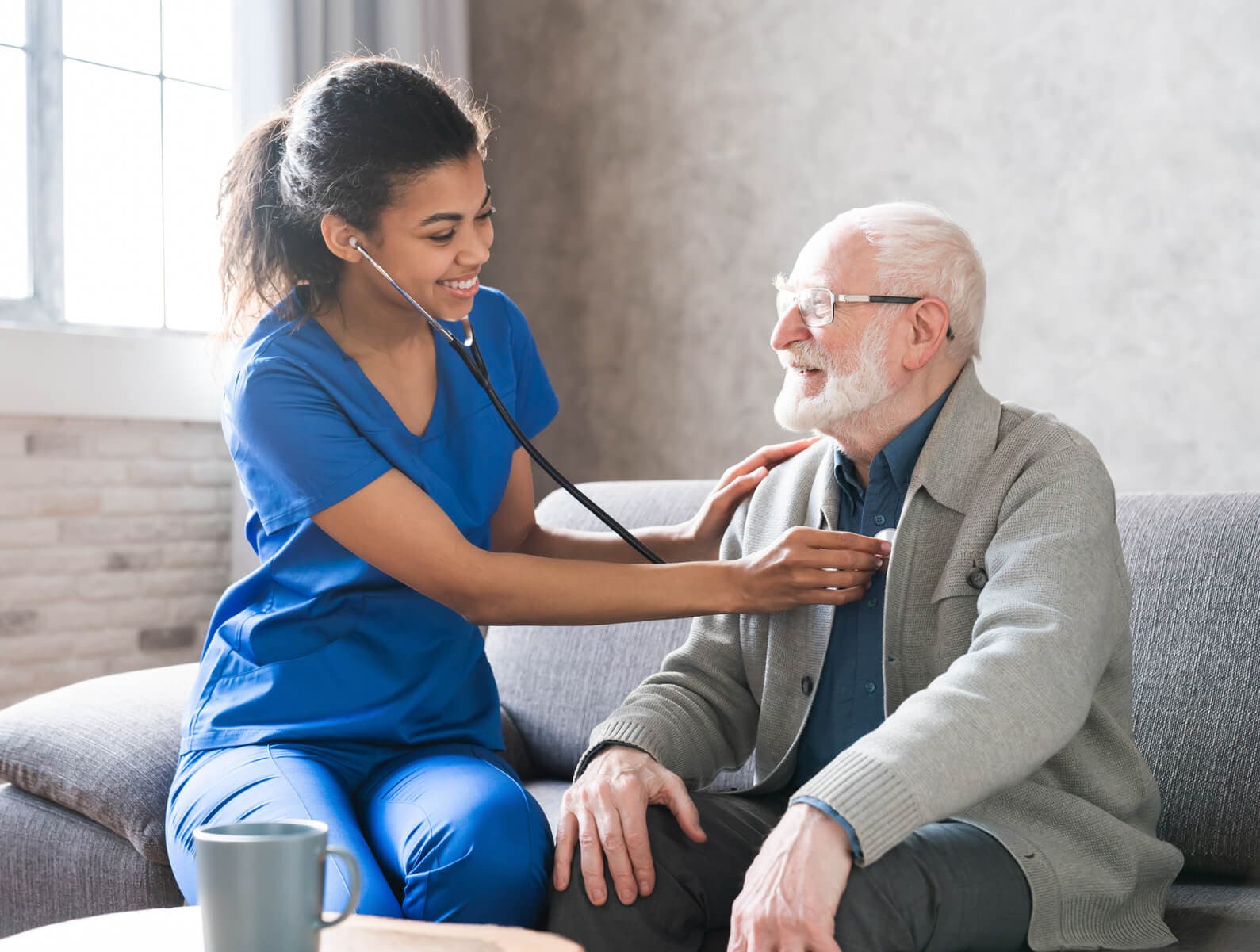 A nurse caring for an elderly patient