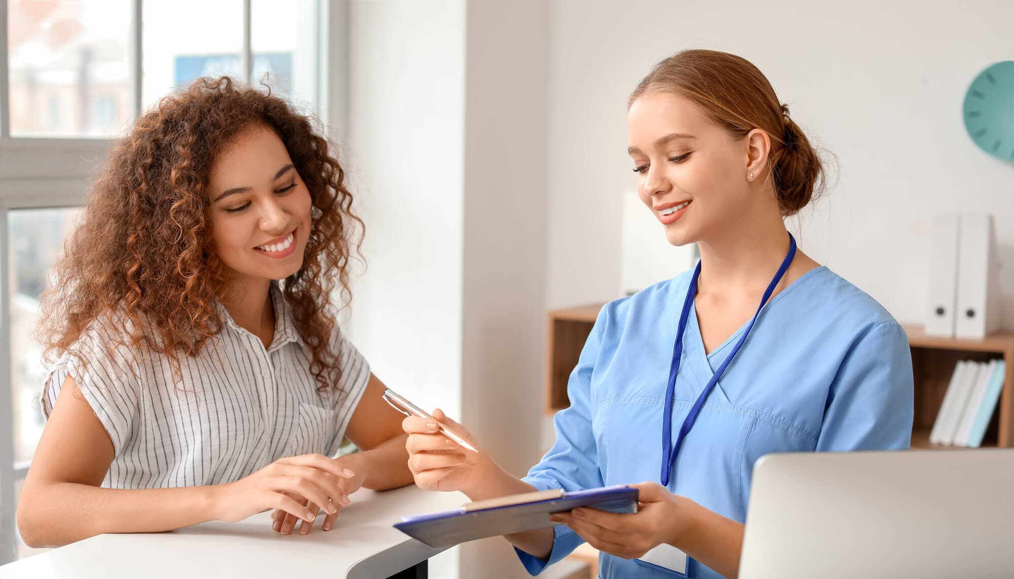A nurse preregistering a patient